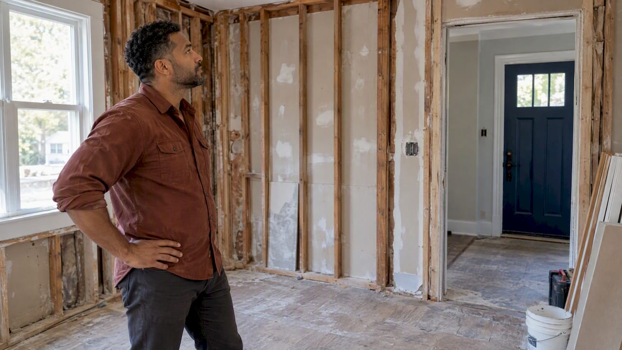 Investor inspecting a home renovation